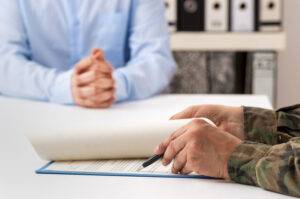 military dependent filling out paperwork