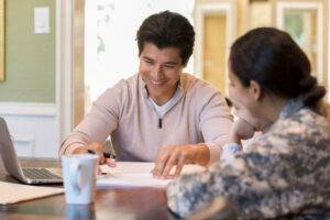 spouses reviewing documents