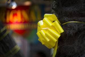 yellow ribbon on tree