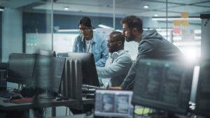 cyber professionals brainstorming in office setting