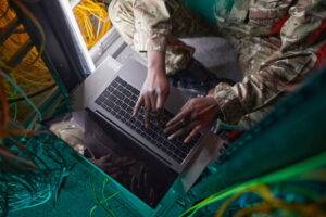 military personnel in server room