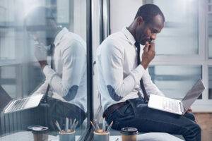 businessman working on a task on laptop