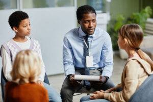 children in group therapy session