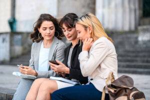 female law students sitting stairs