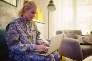 military woman on laptop 