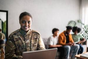 reservist at home on computer