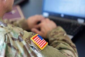 soldier on computer at home