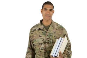 soldier in college holding books