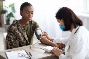 taking soldier's blood pressure (bp)