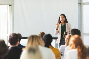 teacher talking with students