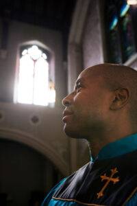 church member in service praying