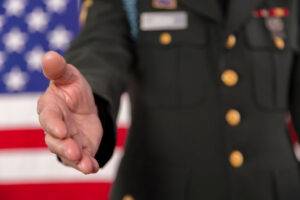military officer shaking hands