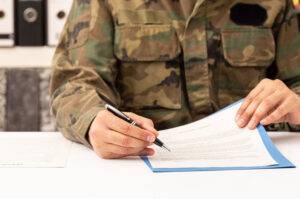 soldier signing contract