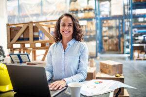 warehouse employee at laptop