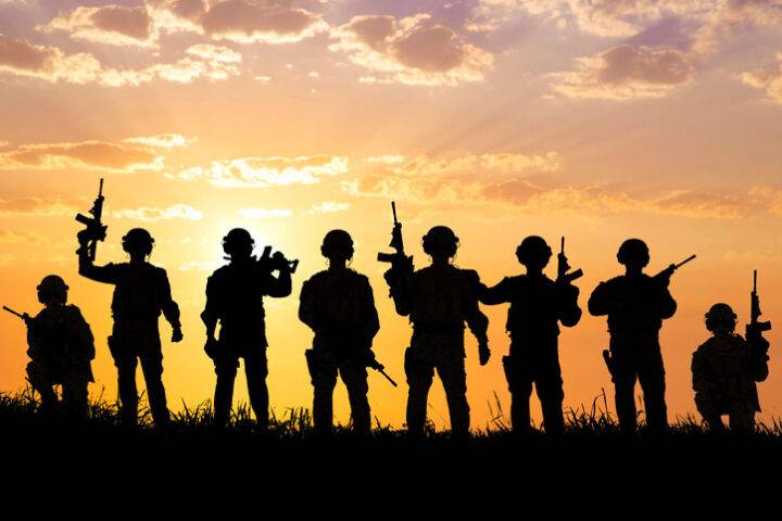 silhouette of soldiers at sunrise