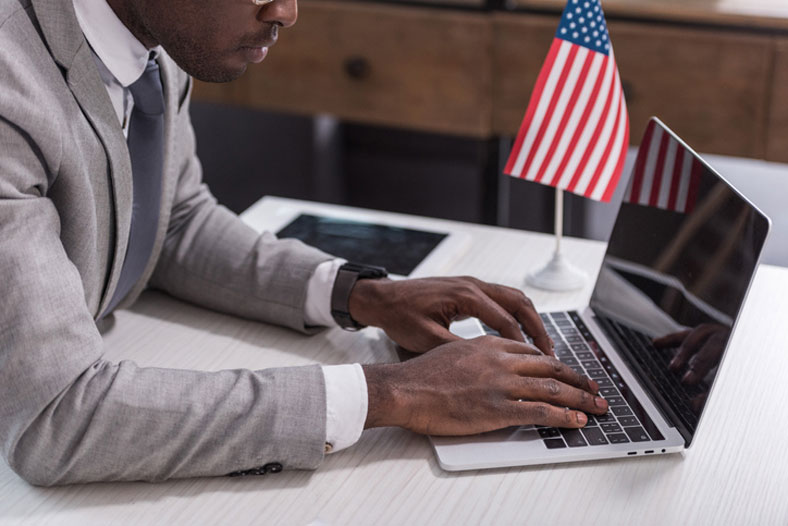 lawyer typing on laptop