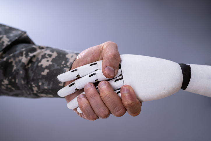 ai robot hand shaking military soldier's hand